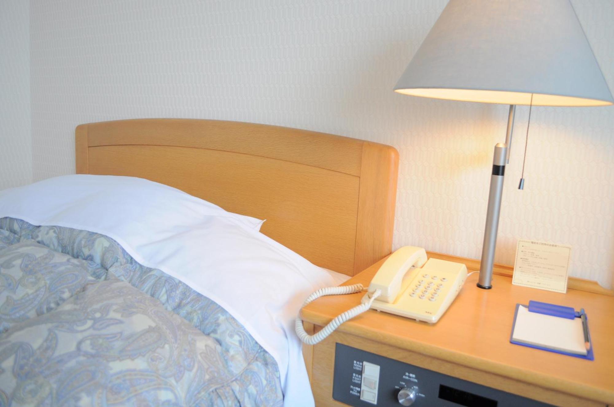 Tateyama Kokusai Hotel Toyama Station Pokoj fotografie
